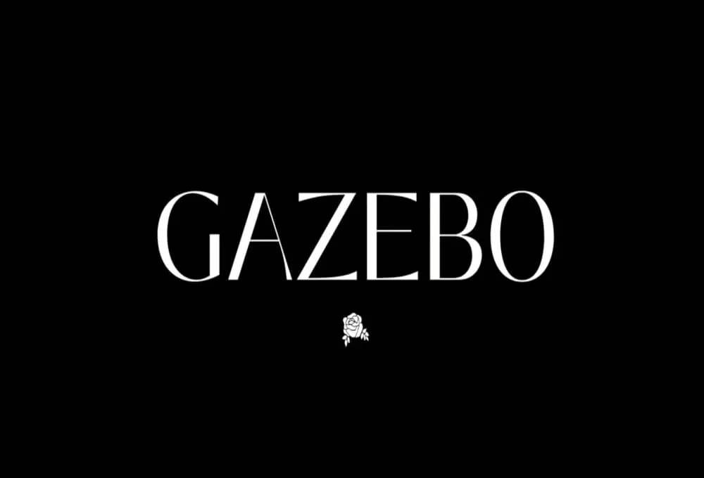 黑底极简品牌标识：中心为GAZEBO非衬线大写英文，字重均匀；下方线条玫瑰轮廓巧妙融入字母负空间设计，呼应Flower Shop酒吧调性。标识无多余装饰，呈现快闪餐厅的先锋美学基因。