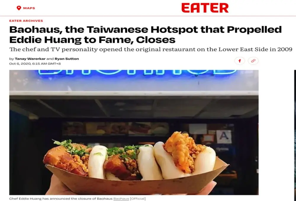 Eater平台报道截图：主图为停业的Baohaus餐厅（蓝光招牌），前景纸盒盛放金黄炸刈包配红绿蔬菜。页面左上角MAPS/EATER图标，标题"Baohaus, the Taiwanese Hotspot...Closes"（2020年10月6日），含黄颐铭闭店声明段落。（注：保留媒体背书及时间戳）